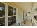 Front porch with rocking chairs, offering a relaxing view of the yard at 980 Whistling Wind, Sanford, NC 27332