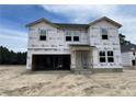 Two-story house with vinyl siding and a large front yard at 2815 Sheriff Watson Rd, Sanford, NC 27332