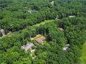 High-angle view of homes situated amongst lush trees and golf course at 595 Chelsea Dr, Sanford, NC 27332