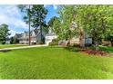 House exterior with landscaped yard at 367 Falling Water Rd, Spring Lake, NC 28390
