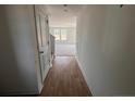 Light and airy entryway with wood-look floors and view to carpeted living area at 47 Marley (Lot 11) Way, Dunn, NC 28334