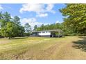 Newly renovated home with carport and porch at 2470 Wire Rd, Erwin, NC 28339