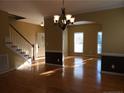 Bright dining room with hardwood floors and chandelier at 420 Lenoir Dr. N Dr, Spring Lake, NC 28390