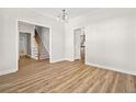 Spacious dining room with hardwood floors and neutral walls at 150 Carrington Ave, Franklinton, NC 27525