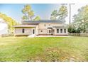 Two-story house with patio and fenced backyard at 3375 Carolina Way, Sanford, NC 27332