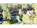 Aerial view of neighborhood with houses and trees at 3375 Carolina Way, Sanford, NC 27332