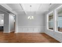 Bright dining room with hardwood floors and wainscoting at 375 Graham Rd, Cameron, NC 28326