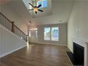 Bright living room with hardwood floors and fireplace at 241 Bunting Dr, Lillington, NC 27546