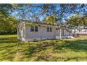 Side view of charming ranch-style home with green lawn at 712 Blount St, Smithfield, NC 27577