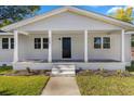 Inviting front porch and landscaping of recently updated home at 712 Blount St, Smithfield, NC 27577