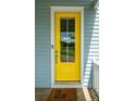 Bright yellow front door with glass panels and a welcome mat at 292 Granite Mill Boulevard Blvd, Chapel Hill, NC 27516