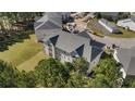 Aerial view of a multi-unit building, showcasing its design and surrounding landscape at 240 Gallery Dr # 304, Spring Lake, NC 28390