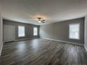 Spacious living room featuring hardwood floors and a ceiling fan at 240 Gallery Dr # 304, Spring Lake, NC 28390