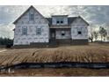 Under-construction home wrapped in protective covering at 196 Hook Dr, Fuquay Varina, NC 27526