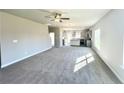 Open concept kitchen with island and stainless steel appliances at 29 Red Bird Dr, Cameron, NC 28326