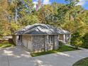 Brick house with attached garage, aerial view at 912 Botany Woods Dr, Sanford, NC 27330