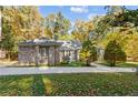Brick house exterior with landscaping and driveway at 912 Botany Woods Dr, Sanford, NC 27330