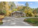 Brick house exterior with attached garage and landscaping at 912 Botany Woods Dr, Sanford, NC 27330