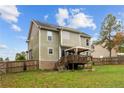 Large backyard with deck, gazebo, and privacy fence at 58 Shortleaf Ct, Cameron, NC 28326