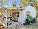 Ranch home with covered porch and side yard at 804 Greenwich St, Raleigh, NC 27610