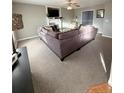 Spacious living room featuring a cozy fireplace and ample seating at 185 Swain St, Spring Lake, NC 28390
