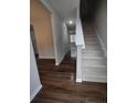 Interior view showing a staircase with dark hardwood floors at 788 Roberts Rd, Sanford, NC 27332