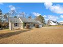 Inviting one-story residence with attached two-car garage and a welcoming front entry at 58 Bayleaf Ln, Sanford, NC 27332