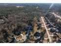 Wide aerial view of the house and surrounding area at 40 Ringneck Ct, Lillington, NC 27546