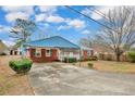 Brick ranch house with carport and large yard at 14313 Nc 210S Hwy, Spring Lake, NC 28390