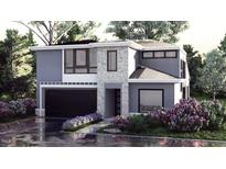 Modern two-story home with stone and siding exterior at 824 Antoine Dr # 8, Durham, NC 27713