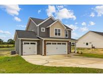 Two-story home with two-car garage and attractive landscaping at 188 Hillwood Dr, Sanford, NC 27332