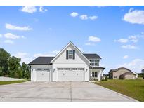 Two story home with a three-car garage at 98 Thistle Ct, Sanford, NC 27332