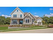 Two-story home with stone and siding exterior at 62 Teal Trace Ct, Pittsboro, NC 27312