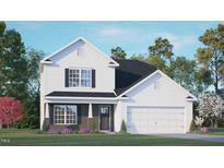 Two story home with white siding, a dark brown brick base, and a two car garage at 401 Shorthorn Dr, Wake Forest, NC 27587