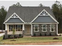 House exterior, stone and shingle accents at 115 Ironwood Blvd # 51, Youngsville, NC 27596