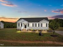 Newly built home with landscaping at 125 Brookhaven Dr, Spring Hope, NC 27882