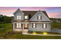 Modern farmhouse style home with stone accents at 4566 Ashtons Way, Franklinton, NC 27525