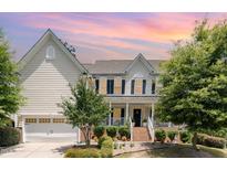 Two-story house with a large front yard at 1329 Endgame Ct, Wake Forest, NC 27587