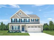 Two-story house with gray siding, white trim, and a two-car garage at 508 Impala Trce, Wendell, NC 27591