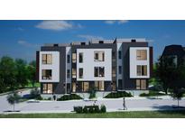 Modern three-story townhome building with dark gray and white exterior and landscaping at 512 Gordon St # 407, Durham, NC 27701