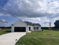 Newly built single story home with attached garage and large yard at 117 Grace Ridge Ct, Benson, NC 27504