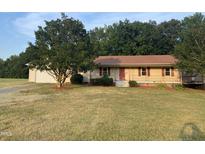 Ranch home with attached garage and porch at 7622 Lindley Mill Rd, Graham, NC 27253