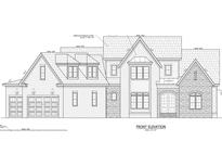 Front elevation of a two-story home with stone and shingle accents at 113 Old Mill Place, Durham, NC 27705