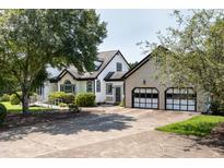 Two-story house with attached two-car garage at 2517 Oakes Plantation Dr, Raleigh, NC 27610