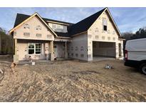 New construction home with attached garage and large front porch at 105 Roma Gora Ct, Princeton, NC 27569