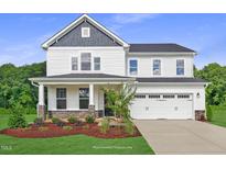 Two-story white house with gray roof, stone accents, and a two-car garage at 81 Eagle Crest Ct # Apex Craftsman, Lillington, NC 27546