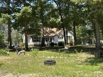 Ranch home with mature trees and a spacious yard at 1060 Saint Paul Church Rd, Roxboro, NC 27574