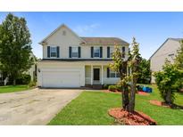 Two-story home with a front porch and attached garage at 216 Stoney Dr, Durham, NC 27703