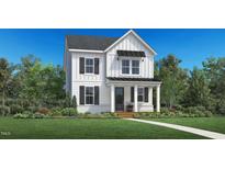 Two-story farmhouse with dark accents and landscaping at 1353 Hurston Ln, Knightdale, NC 27545