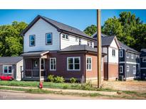Modern two-story house with a unique exterior design and landscaping at 508 East End Ave, Durham, NC 27703
